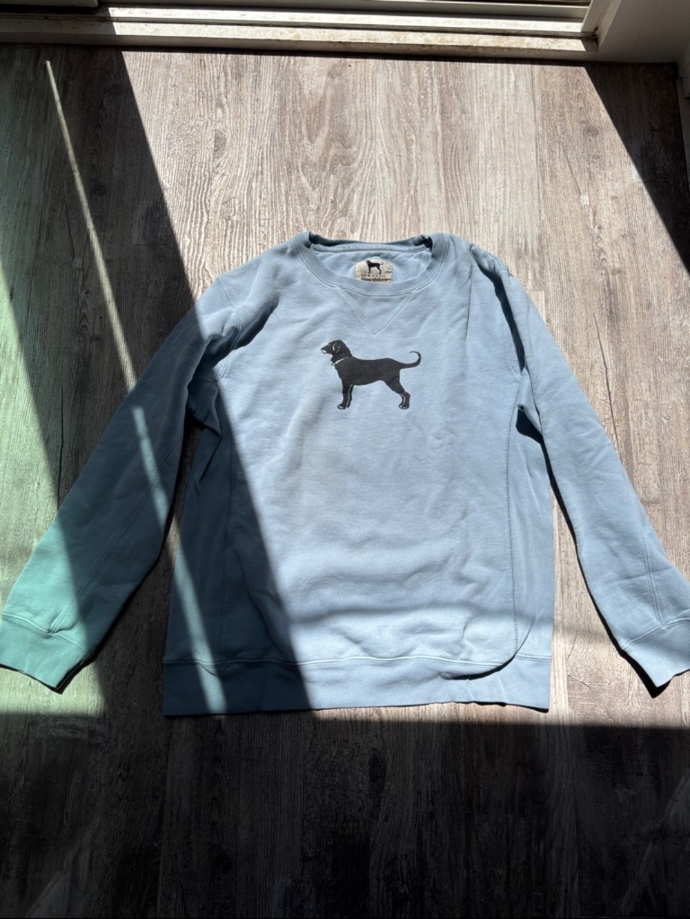 The Black Dog Light Blue Crewneck Sweatshirt with Black Dog Logo